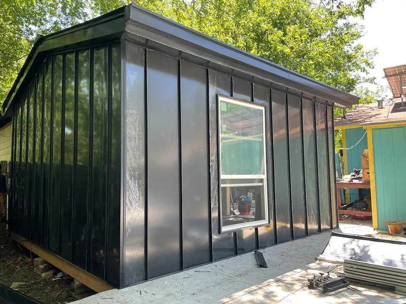 Black standing seam metal wall panels for Roof Inspection in Seven Corners