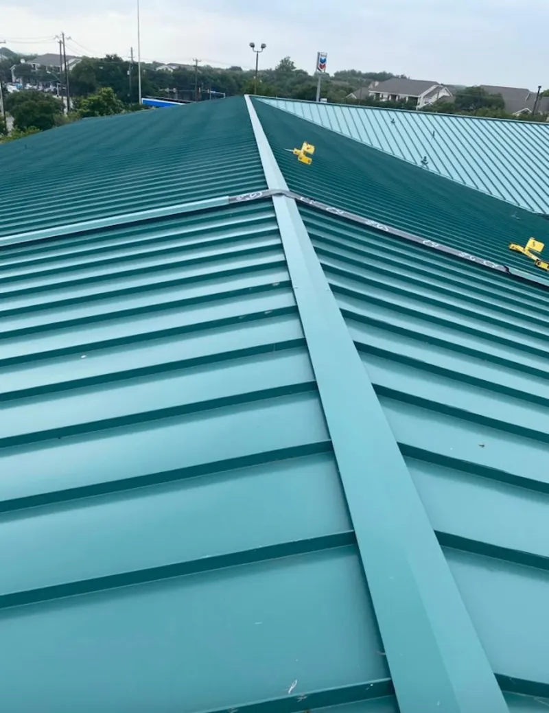Green commercial metal roof ridge and valley for Metal Roof Repair in Seven Corners